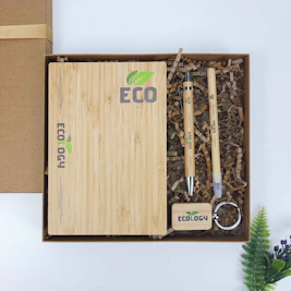 A wooden box with a bamboo keychain and a bamboo box with a bamboo