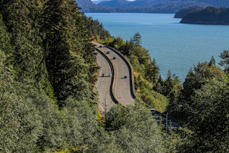 A scenic view of a road near a body of water