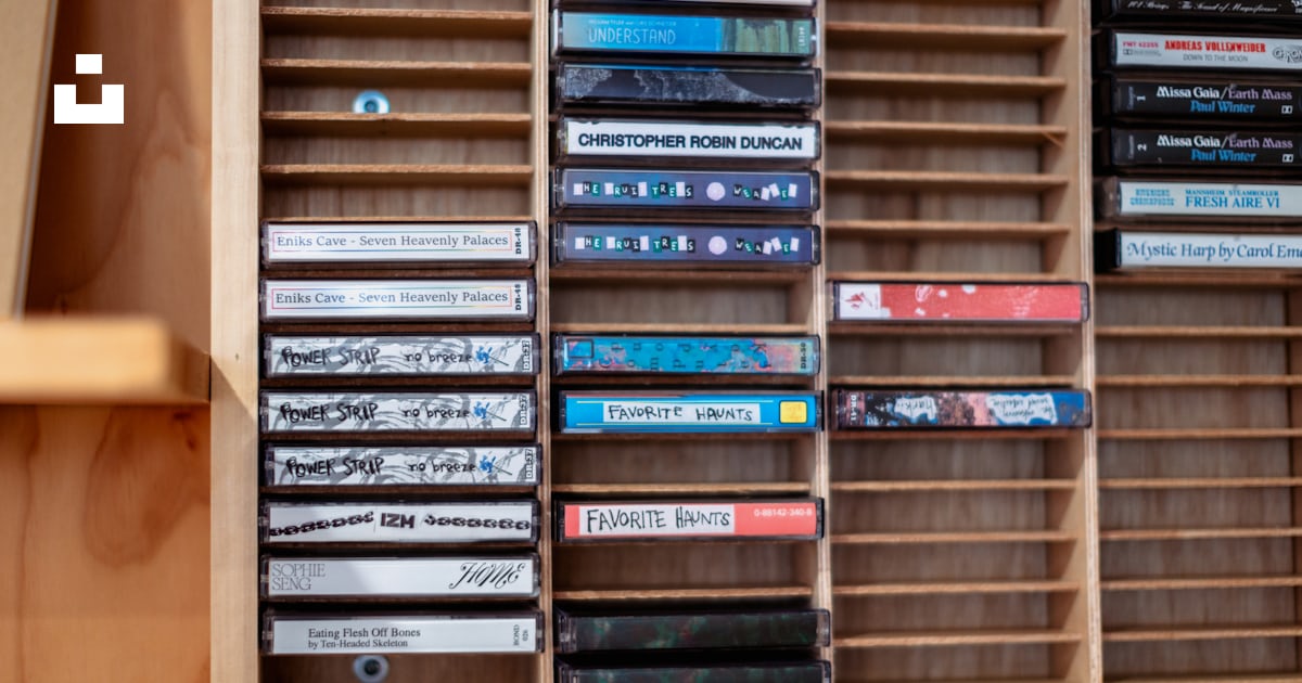 A wooden shelf filled with lots of dvds photo – Free Interior design ...