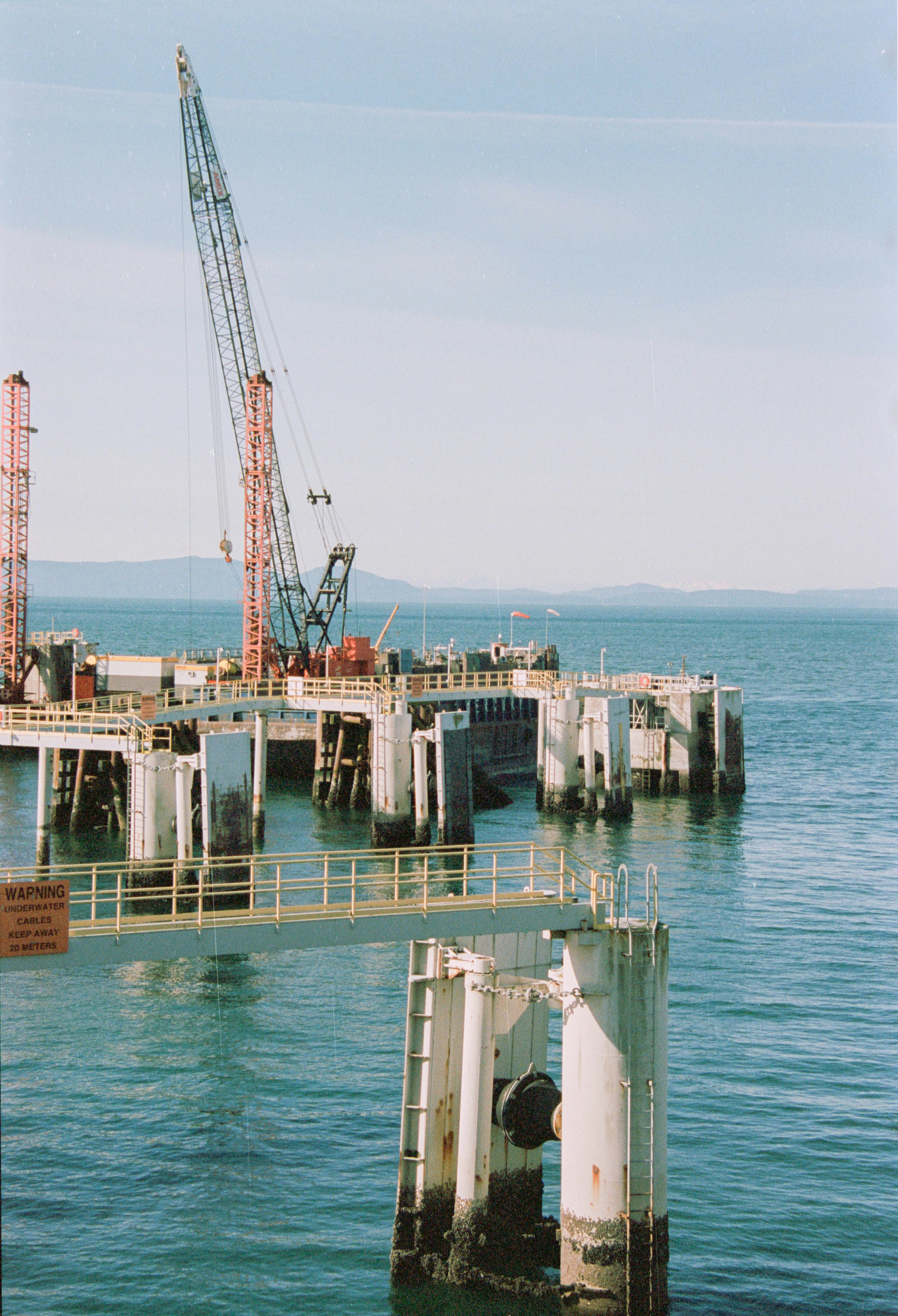 Engineers working on seawall construction at a coastal site