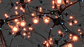 Interconnected dark nerve cells with glowing orange nodes and small blue light pulses
