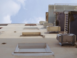 A building with a lot of windows and a sky background