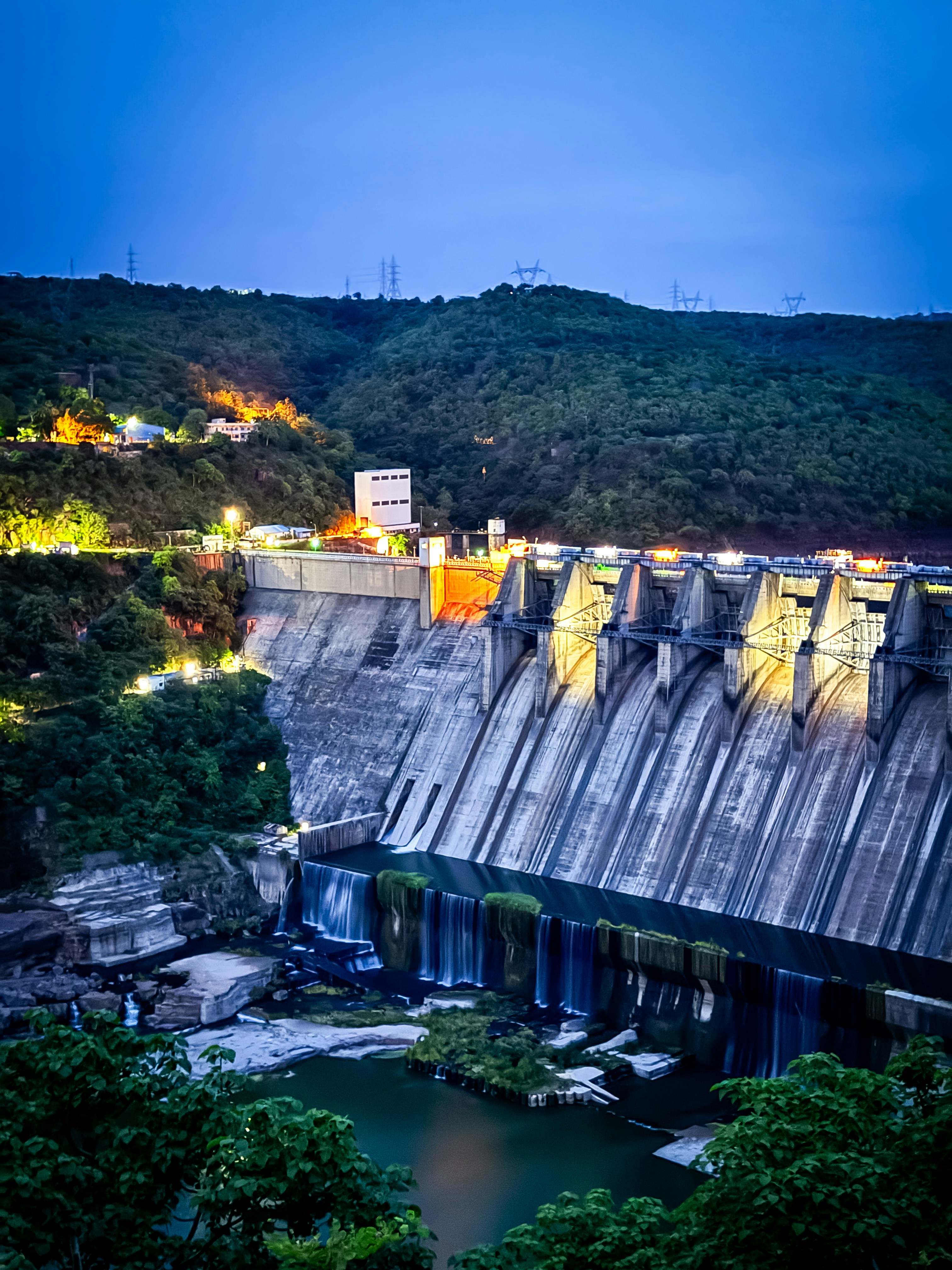 A view of a large dam at night