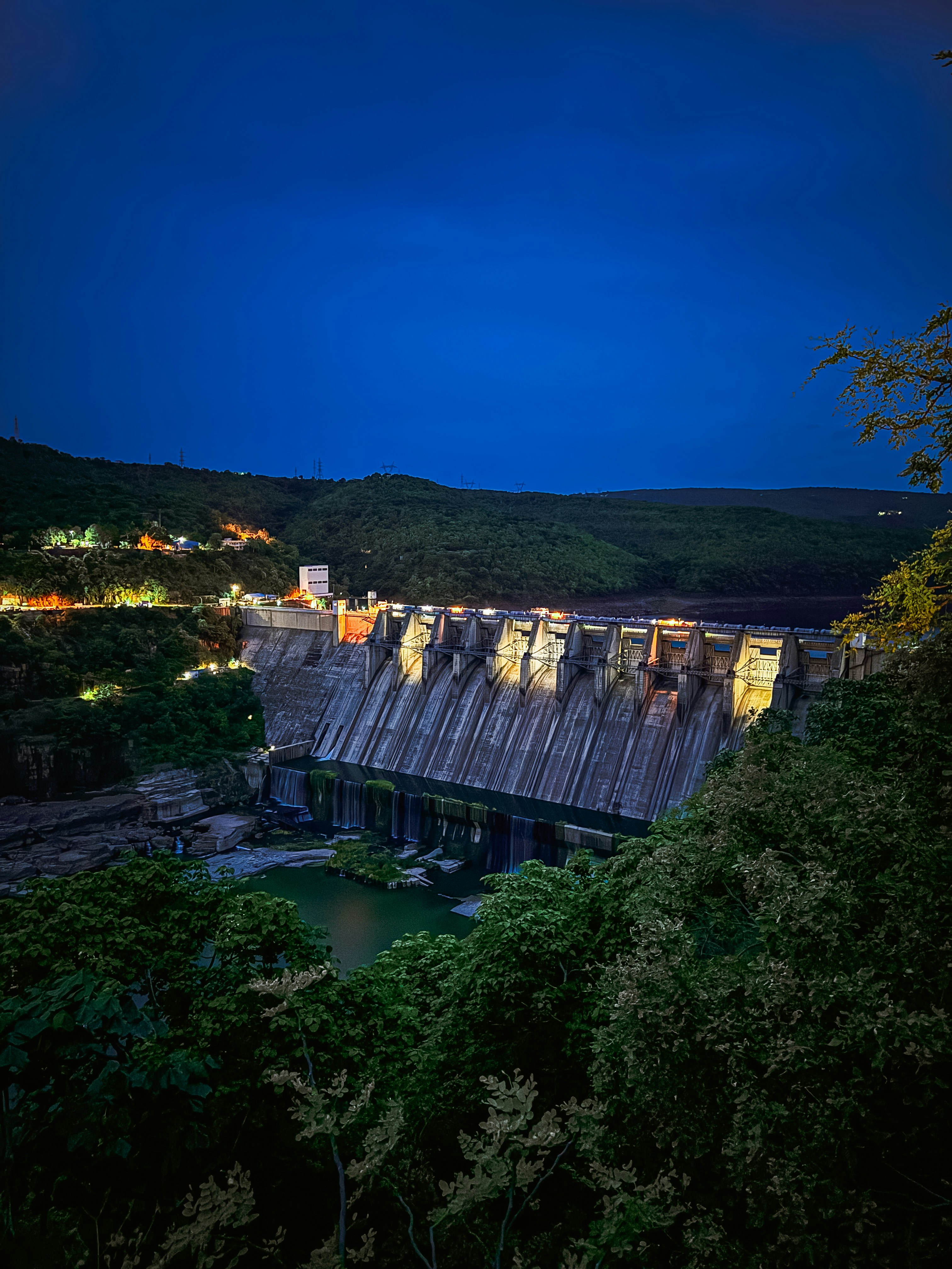 A view of a dam at night time