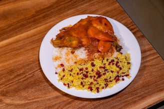 A plate of food on a wooden table