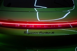 A close up of the tail lights of a sports car
