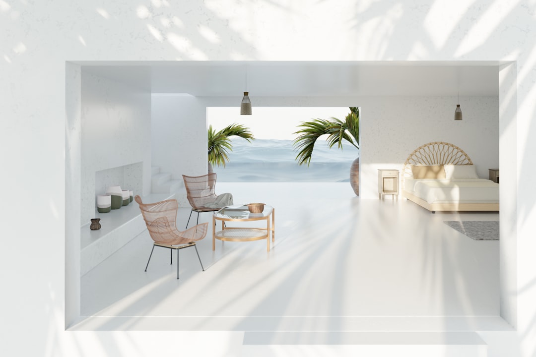 A white room with a view of the ocean,