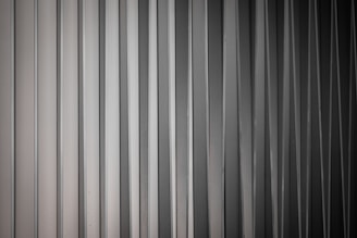 A black and white photo of a curtain