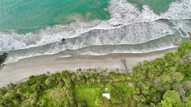 An aerial view of a beach and ocean