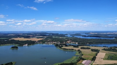 An aerial view of a lake surrounded by land