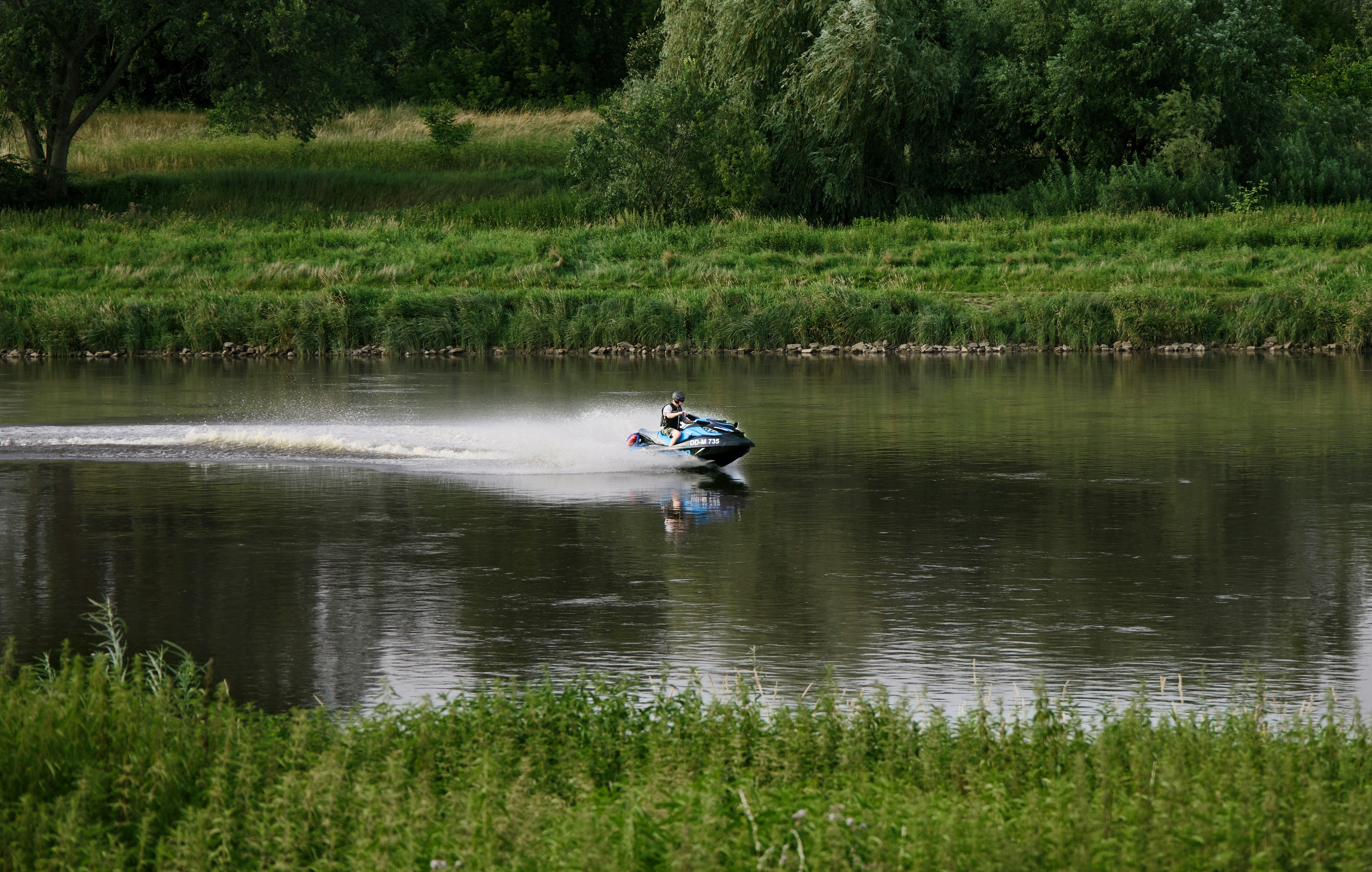 A person on a jet ski in a body of water