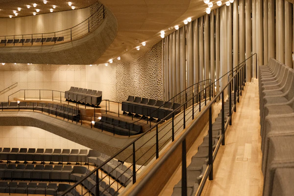 An empty auditorium lined with wood