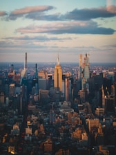 An aerial view of a city with tall buildings