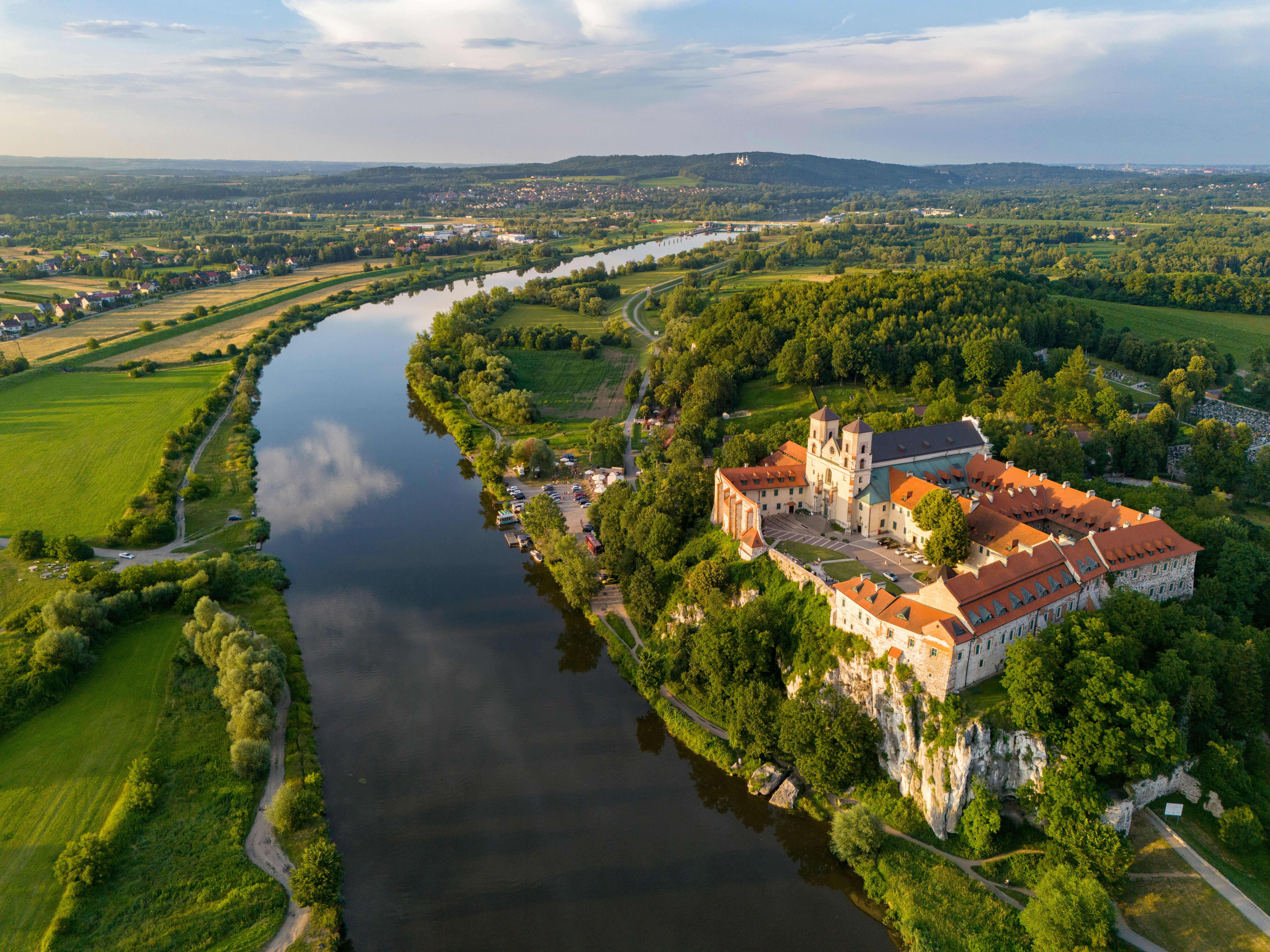 An aerial view of a castle and a river
