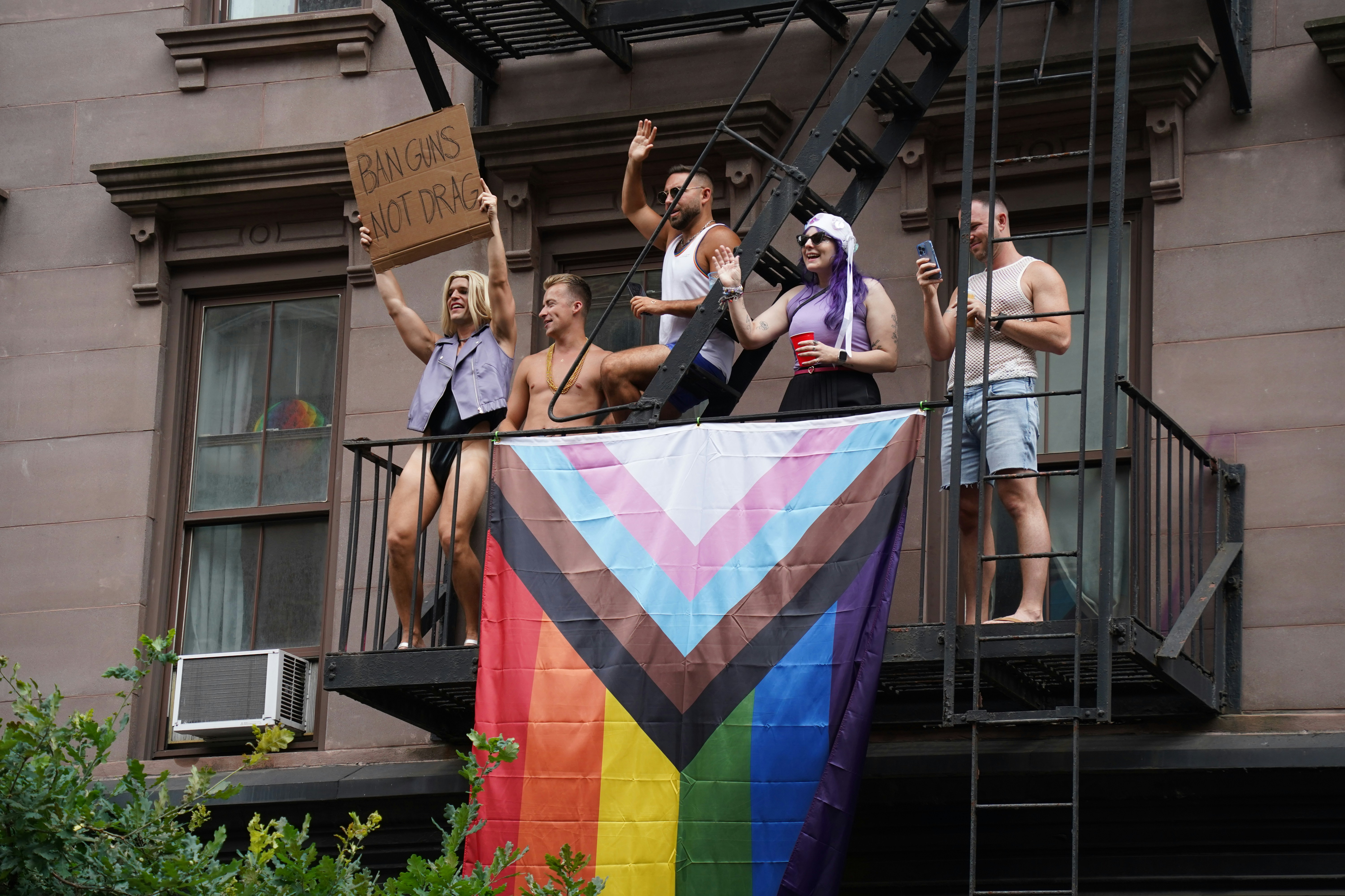 A group of people standing on top of a building