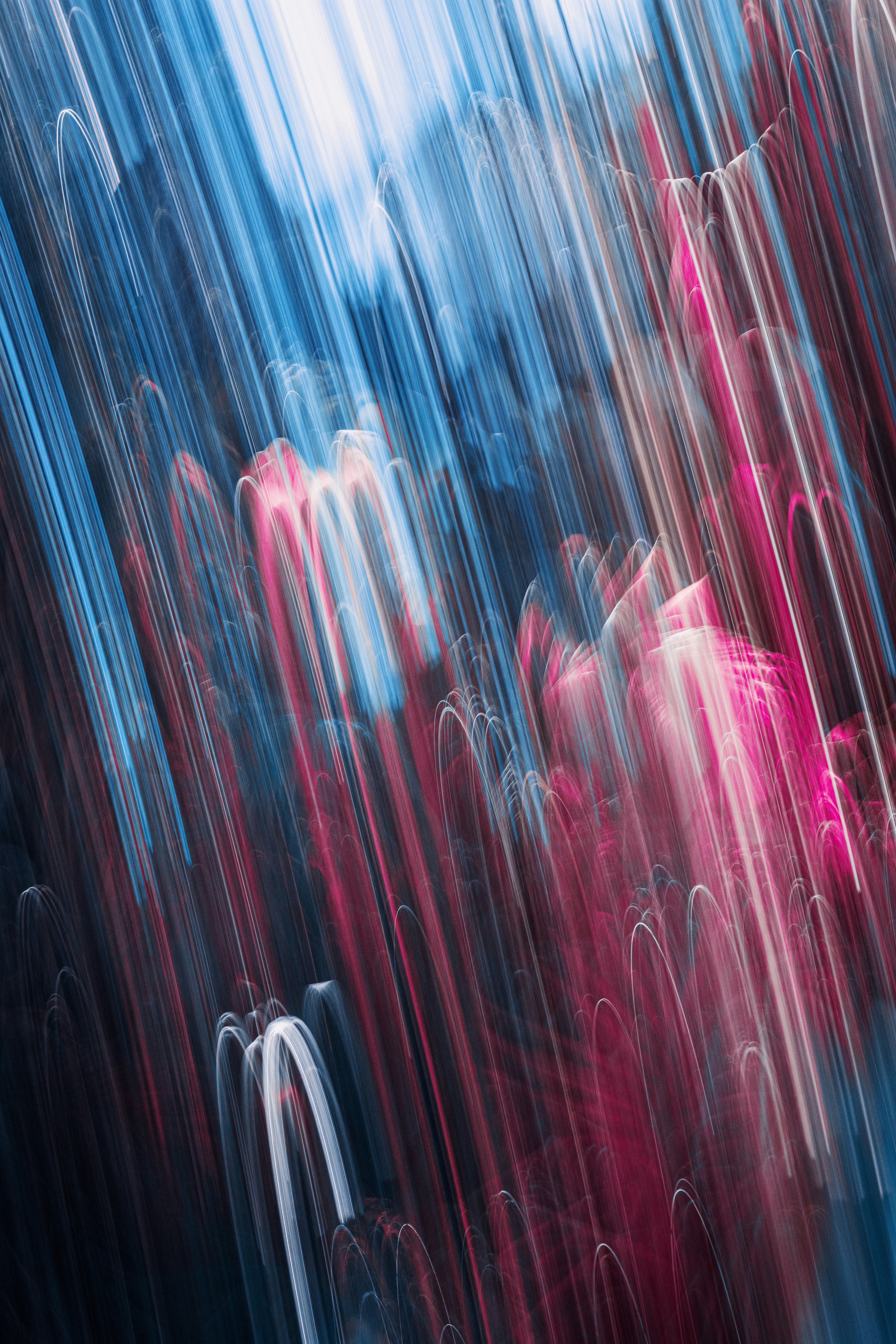 A blurry photo of a city with buildings in the background