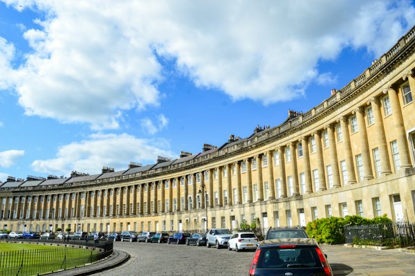 A car parked in front of a large building — Bath, United Kingdom