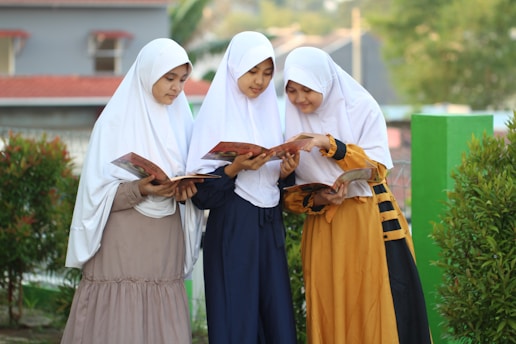 A group of women standing next to each other