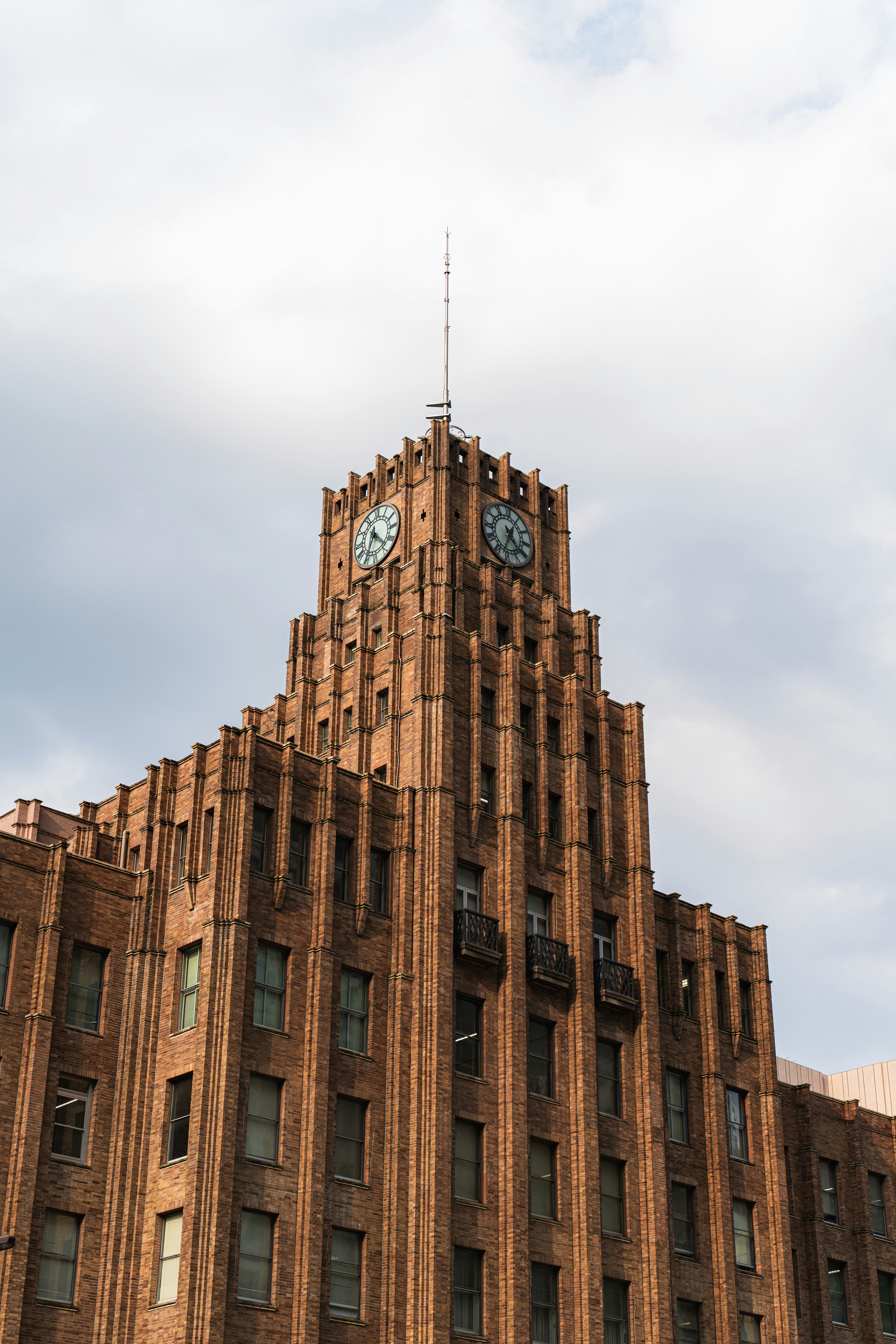 A tall building with a clock on the top of it