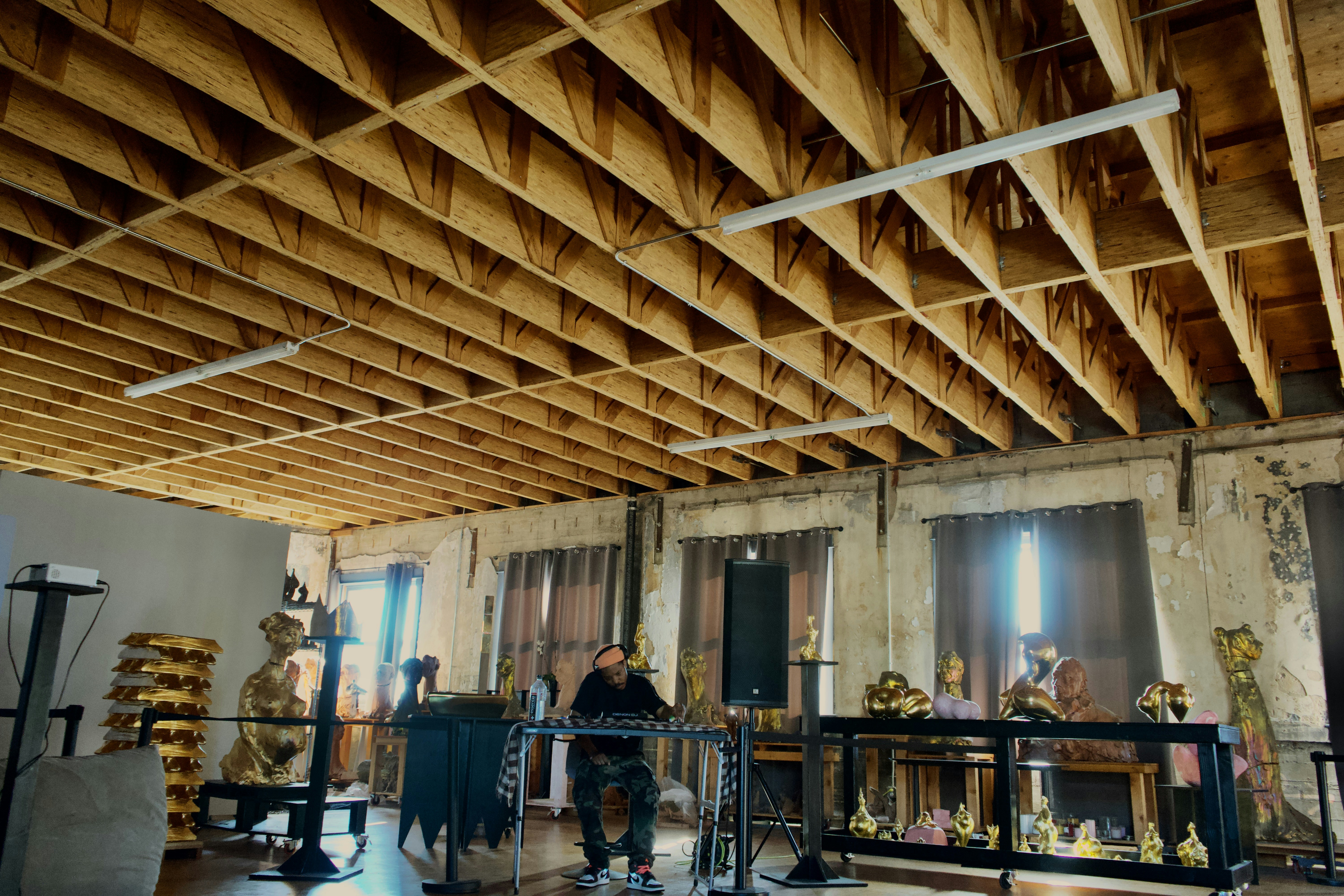 A group of people standing in a large room