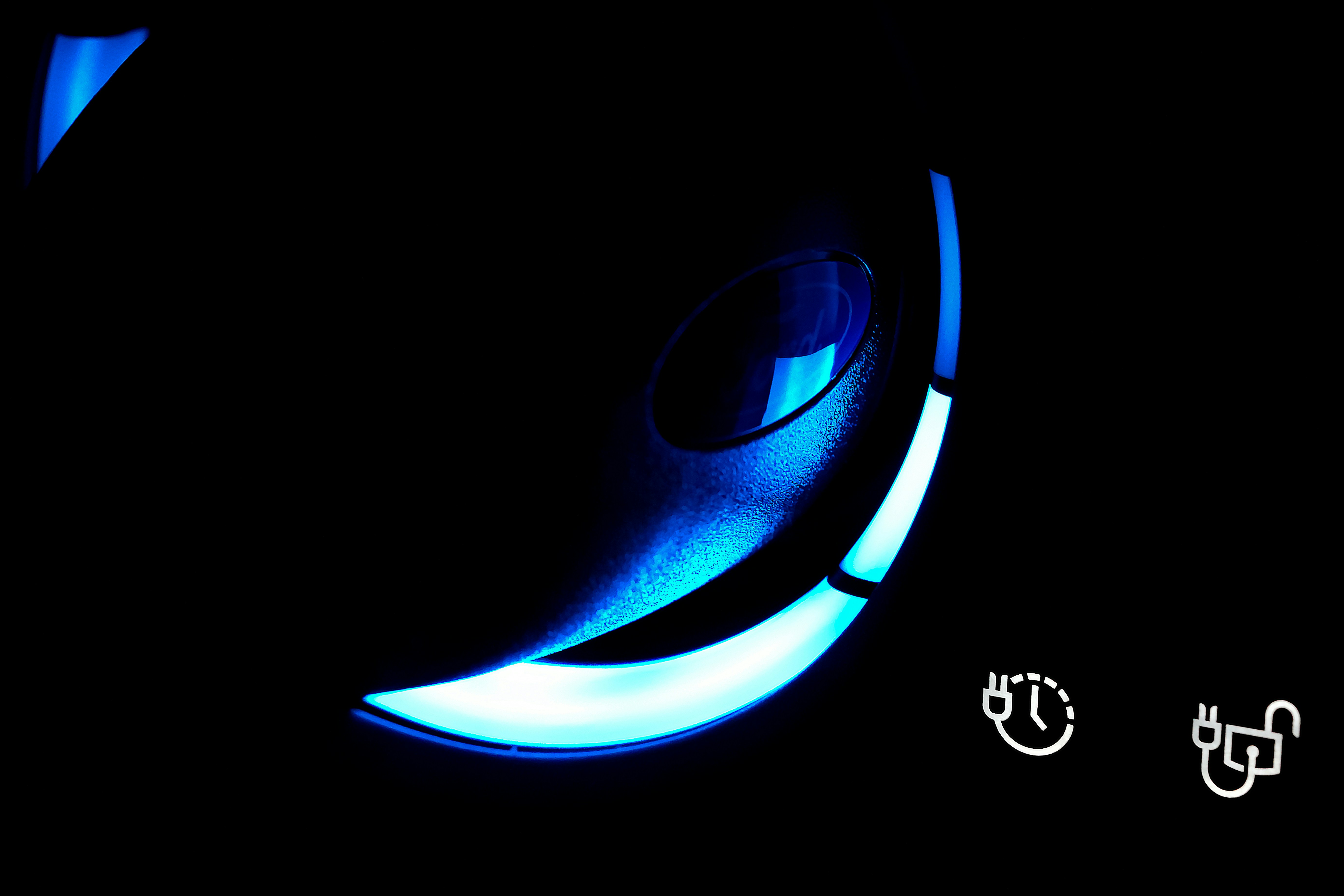 A close up of a car's dashboard light