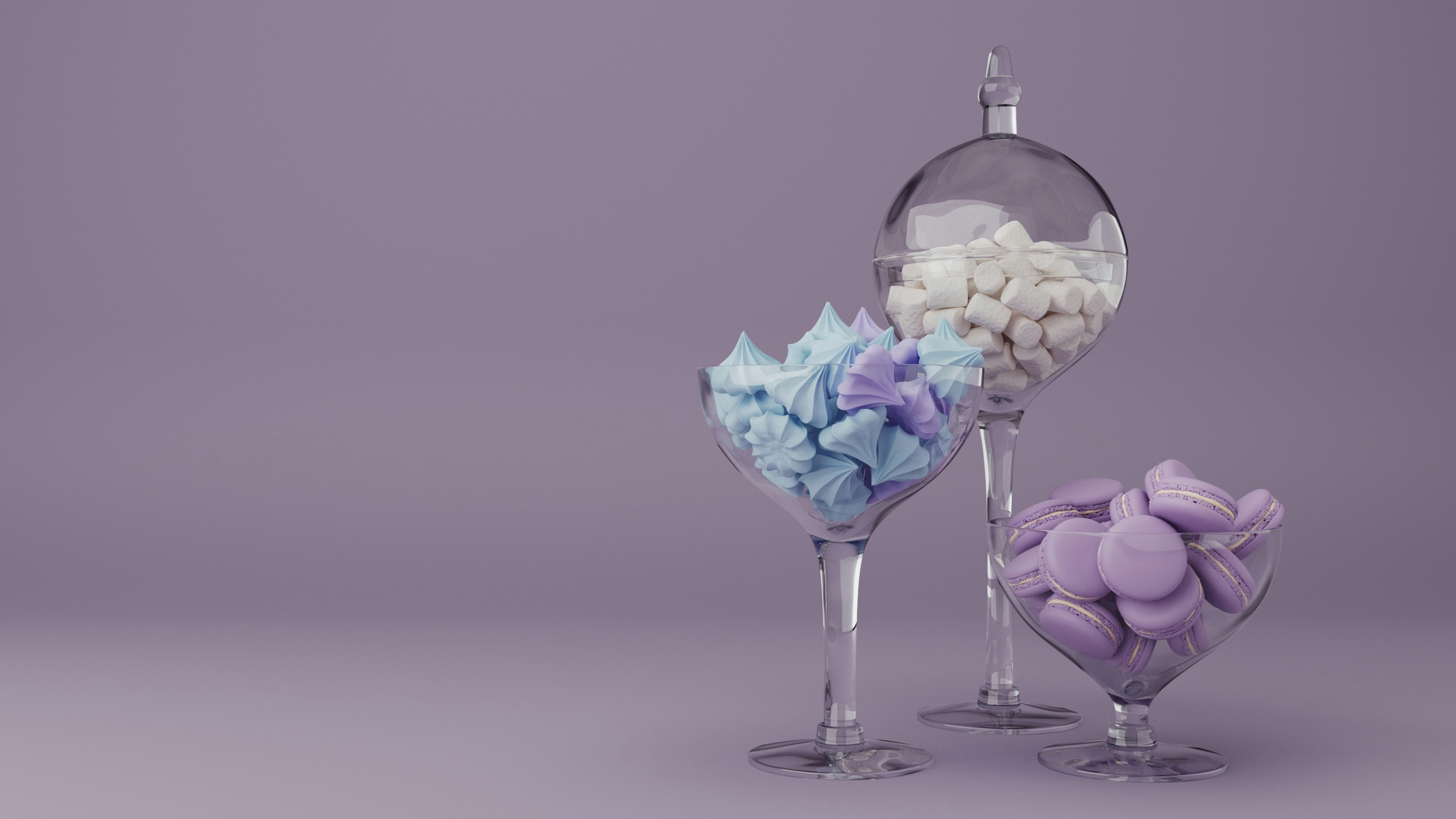 A couple of wine glasses filled with candy