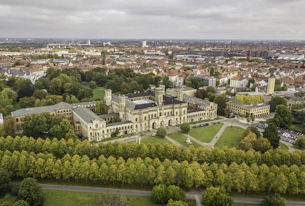 An aerial view of a city with a lot of trees