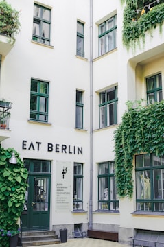 A building with ivy growing on the side of it