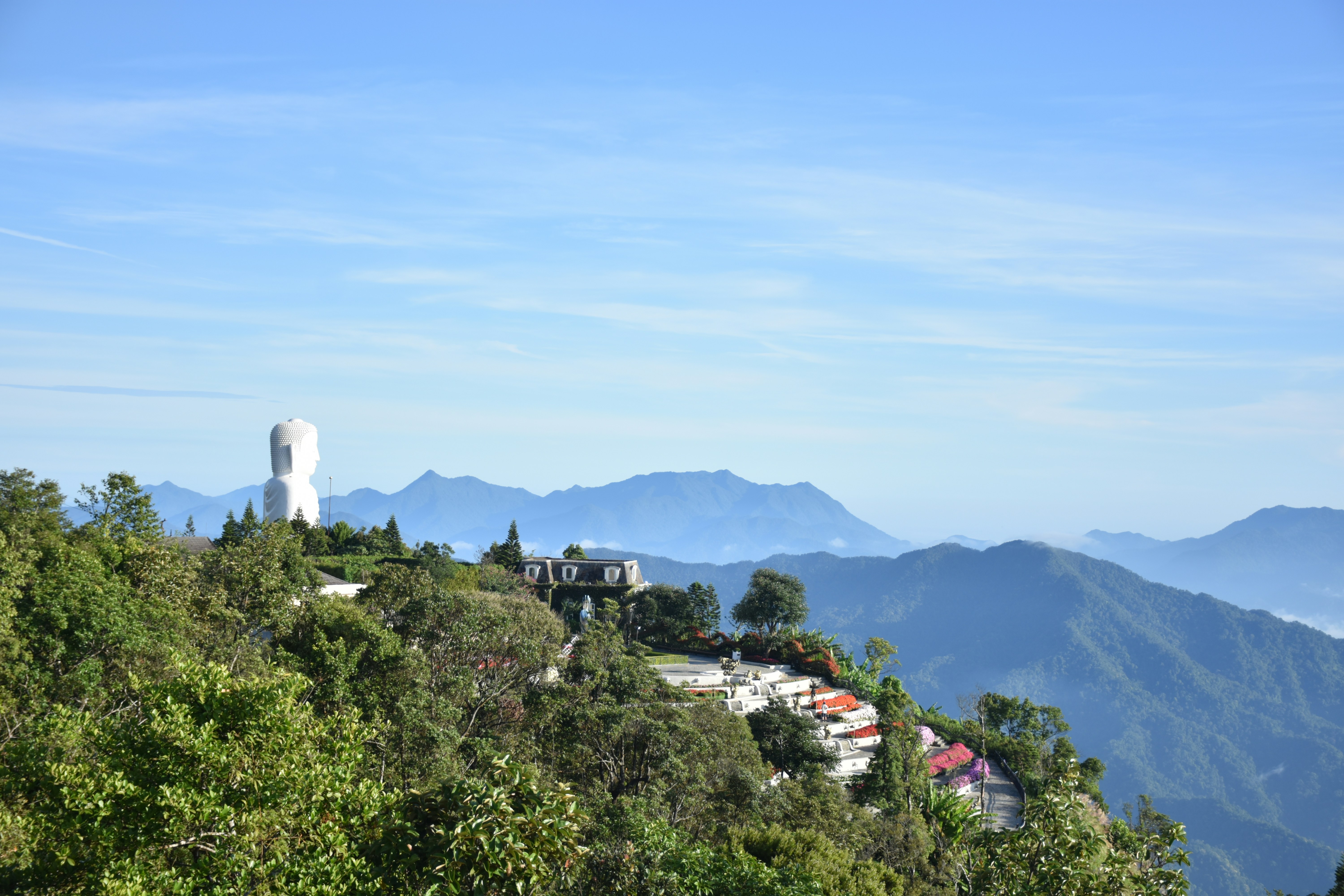 A view of the mountains from a hill top