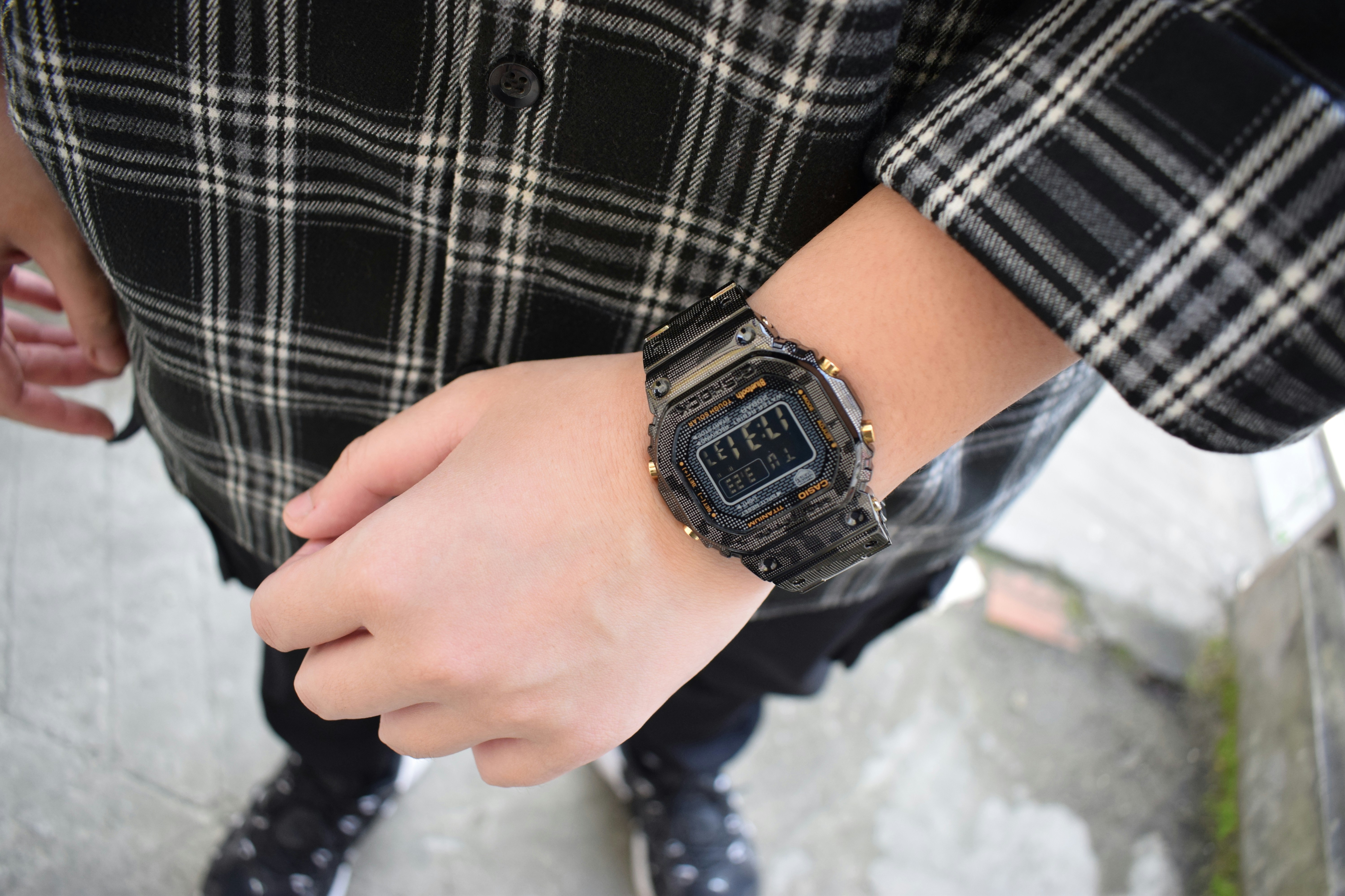 A close up of a person wearing a watch