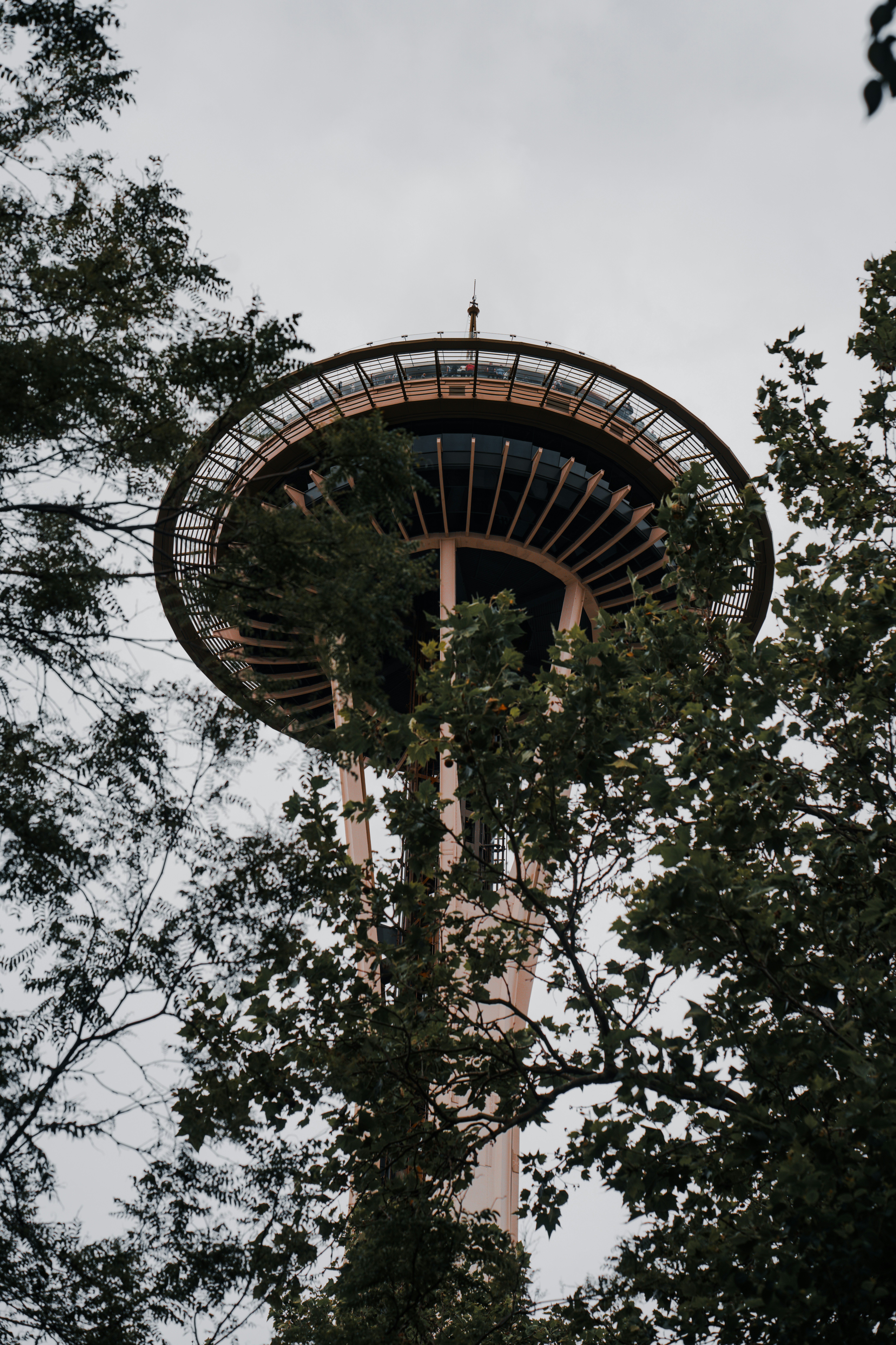 A tall tower with a clock on the top of it