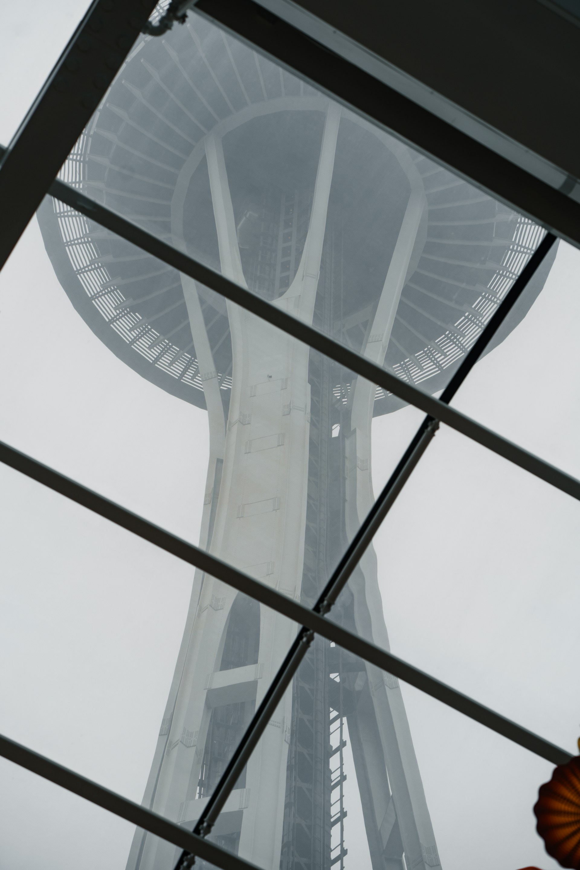 A view of the space needle through a glass window