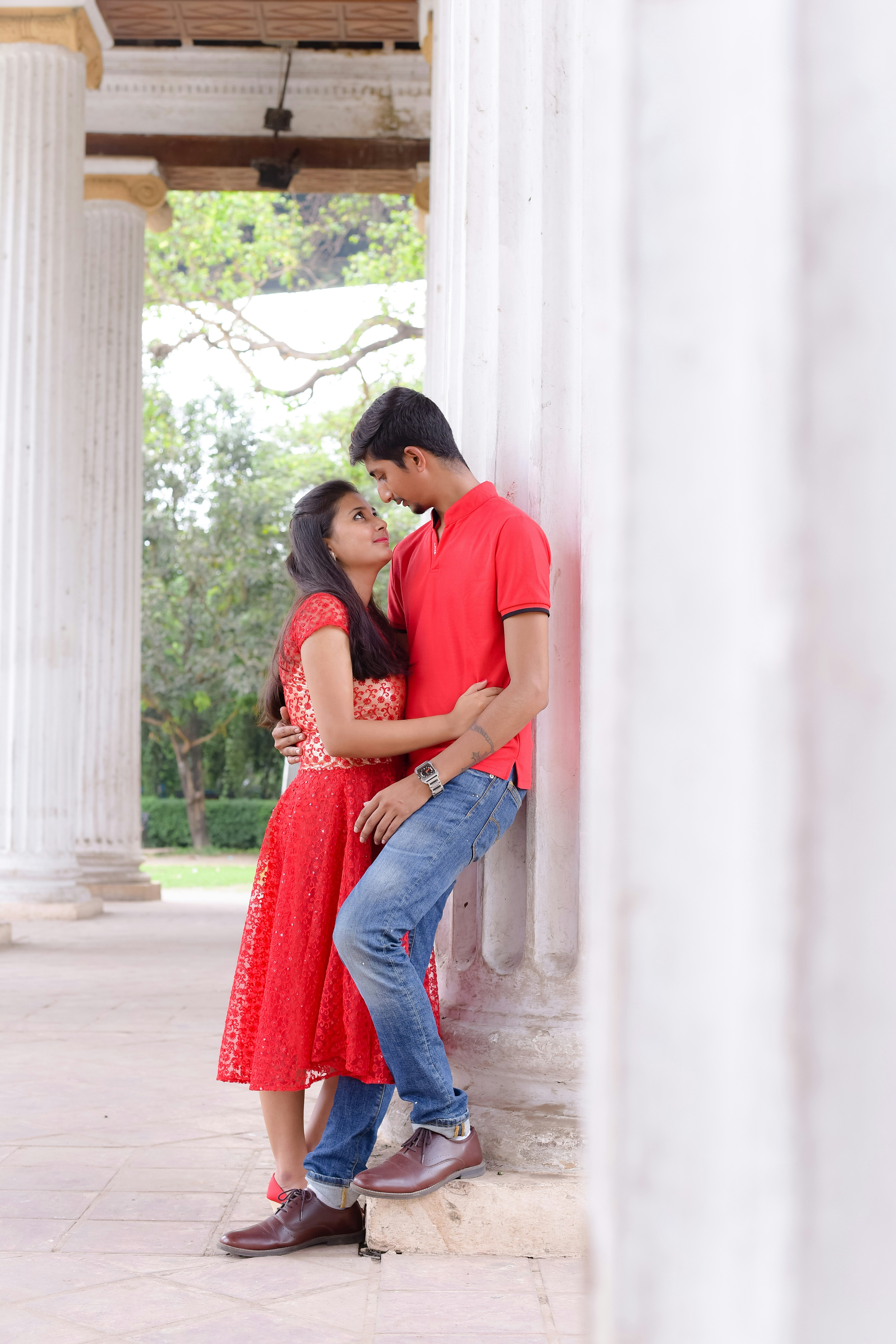 A man and a woman standing next to each other