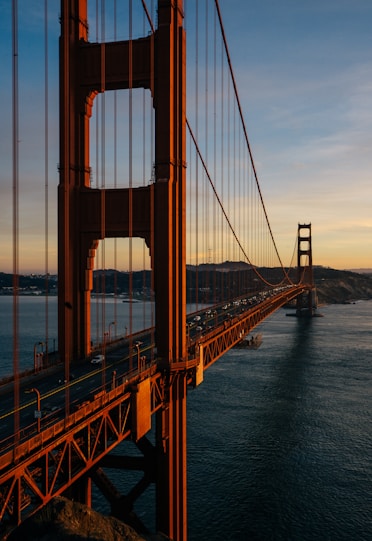 A view of the golden gate bridge at sunset