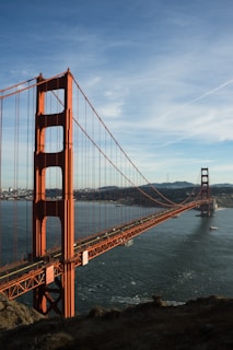 A view of the golden gate bridge from the top of a hill