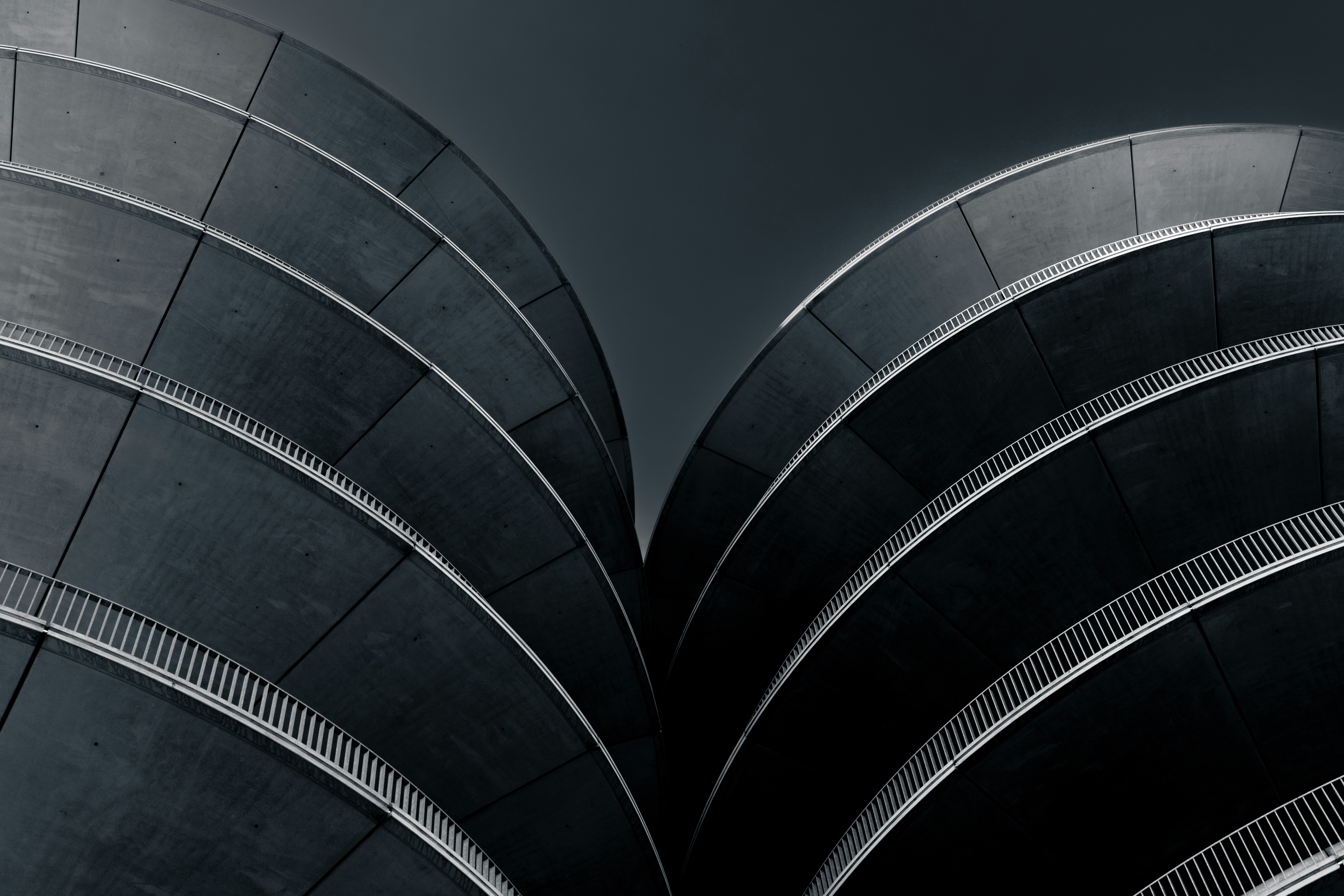 A black and white photo of a bunch of tires