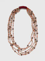 Multi-strand coral and bead necklace with red clasp