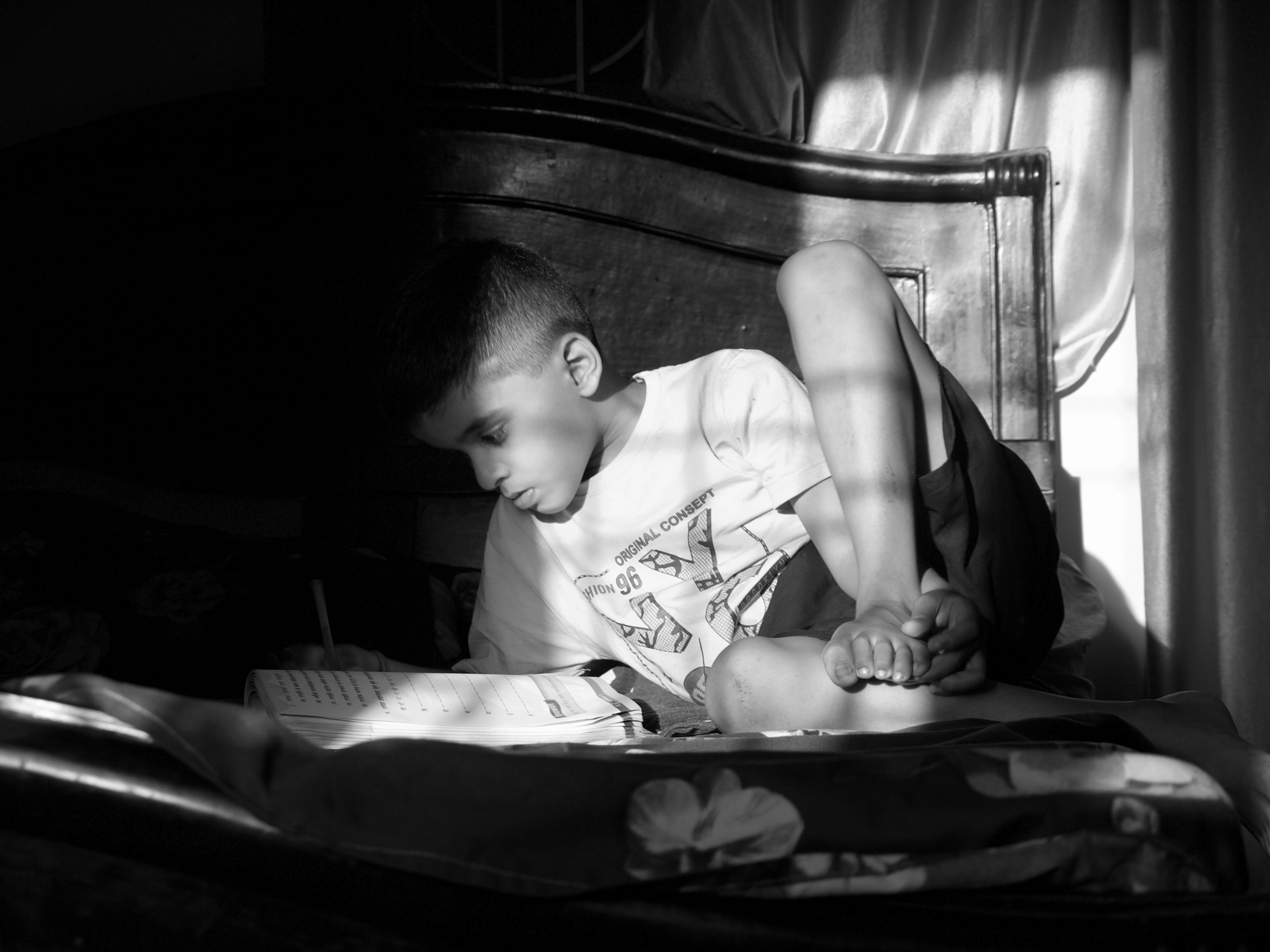 Nepali student studying at home