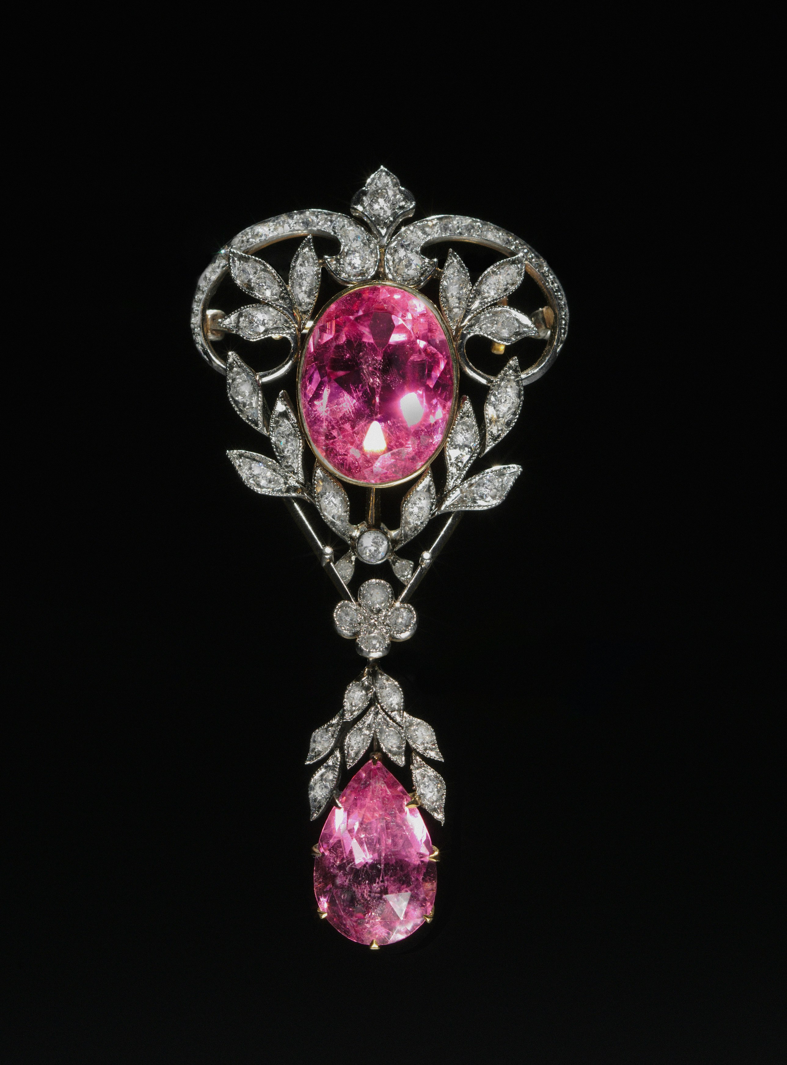 Decorative gold-tone brooch and jewelry detail