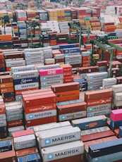 A large amount of shipping containers stacked on top of each other
