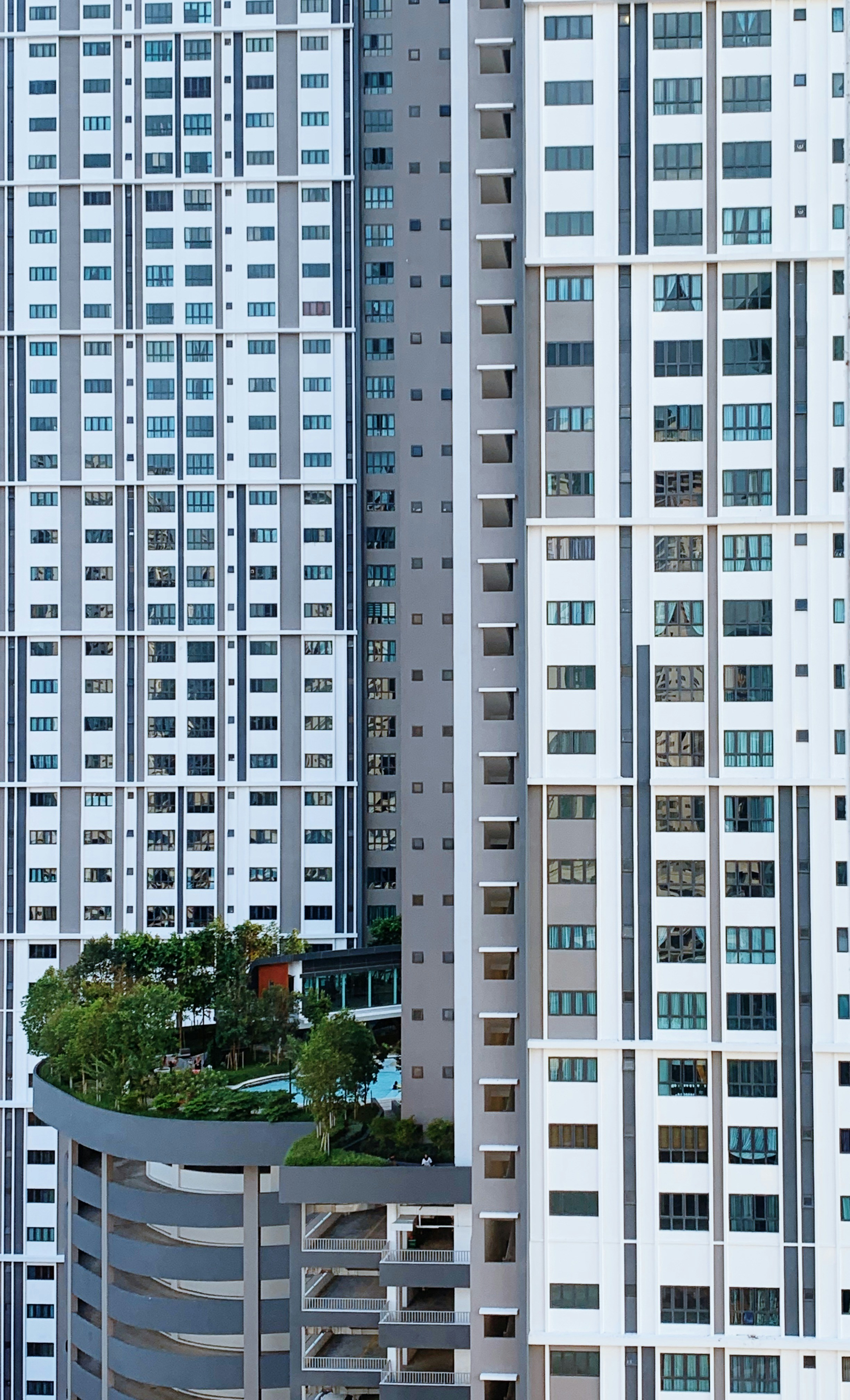 Apartment building with modern architecture and rooftop terrace