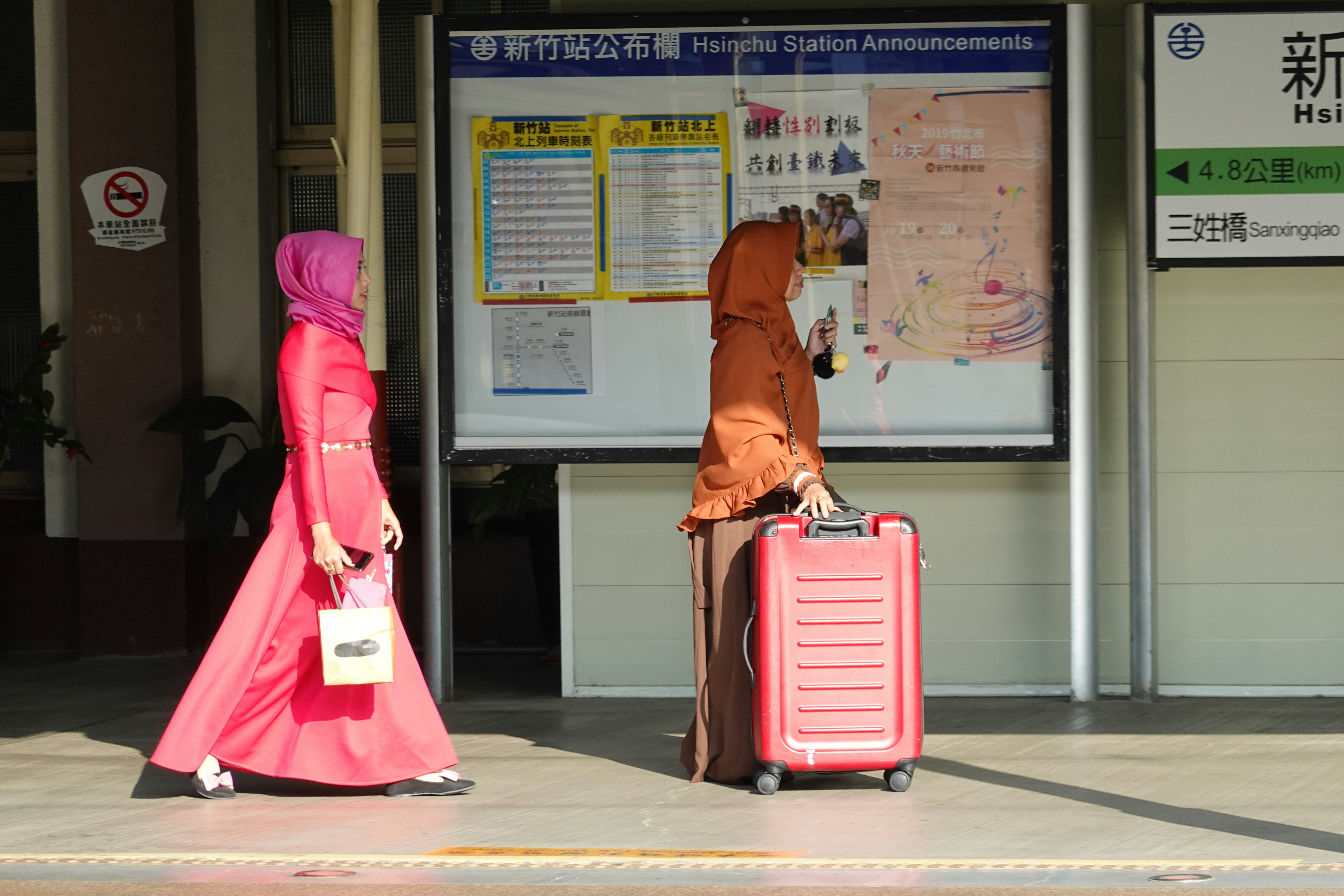 A woman in a hijab and a woman in a hijab with
