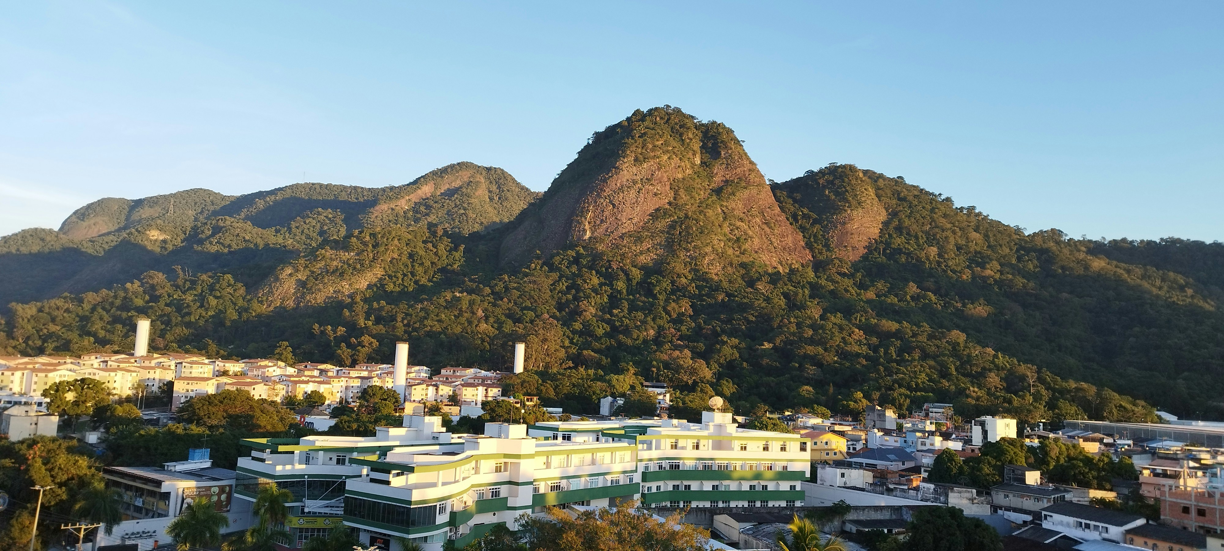 A view of a city with mountains in the background
