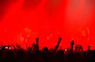 A crowd of people standing on top of a stage
