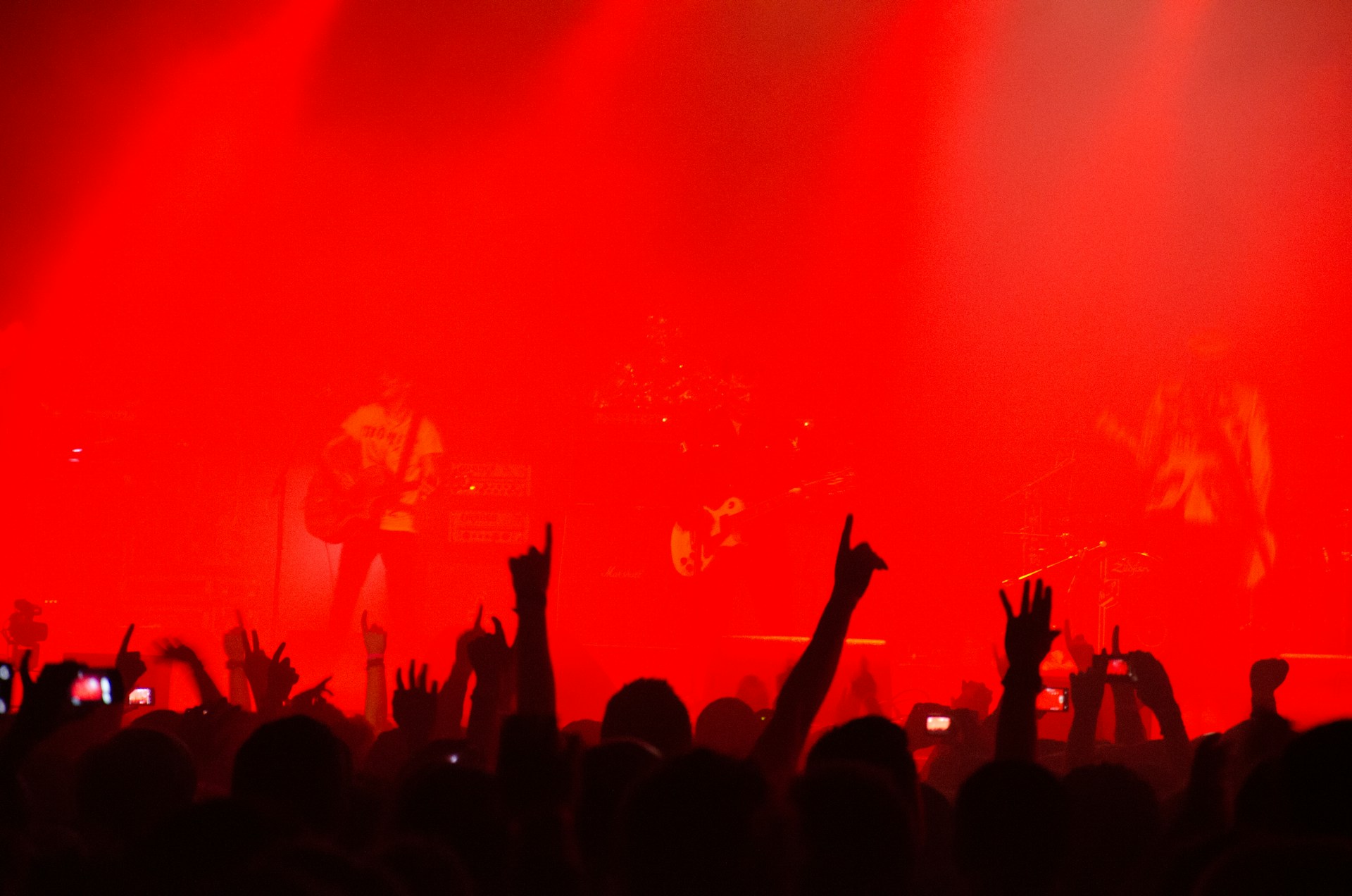A crowd of people standing on top of a stage