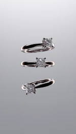 A couple of rings that are sitting on a table