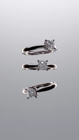 A couple of rings that are sitting on a table