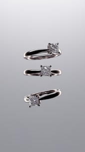 A couple of rings that are sitting on a table