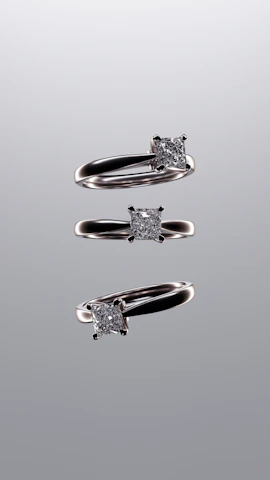 A couple of rings that are sitting on a table