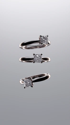 A couple of rings that are sitting on a table